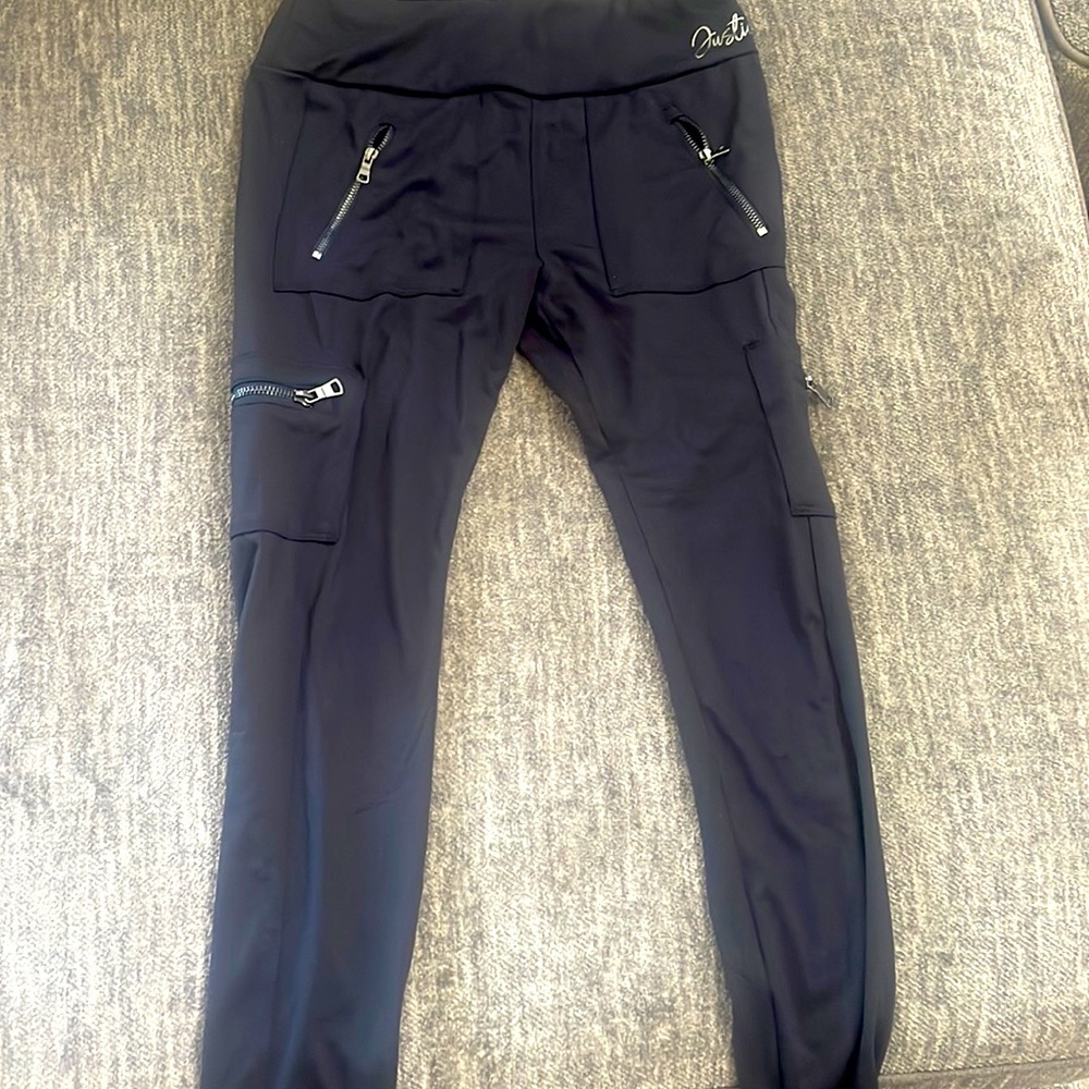 Legging with 4 pocket zippers color black size 12 in girls from justice.